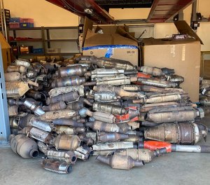 About 1,000 stolen catalytic converters sit in a Beaverton Police Department garage after being taken for evidence in a months-long investigation into a local organized crime ring.
