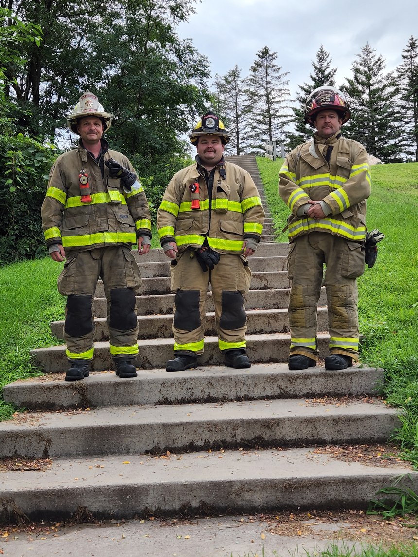 Lt. Josh Mancl, Port Edwards Fire Department, Deputy Chief Wes Mork, Iola Fire and Ambulance, and Firefighter Patrick Knautz, Iola Fire and Ambulance, and a dozen other co-workers from Cintas Stevens Point walked 5.7 miles on a community trail or climbed 2,200 stair steps, in honor of the steps climbed by FDNY firefighters on 9/11. 
