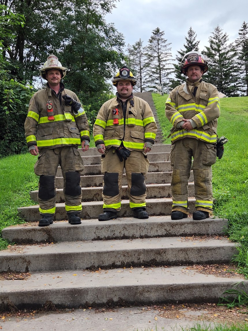 Lt. Josh Mancl, Port Edwards Fire Department, Deputy Chief Wes Mork, Iola Fire and Ambulance, and Firefighter Patrick Knautz, Iola Fire and Ambulance, and a dozen other co-workers from Cintas Stevens Point walked 5.7 miles on a community trail or climbed 2,200 stair steps, in honor of the steps climbed by FDNY firefighters on 9/11.