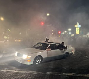 An early morning street takeover at Compton Boulevard and Atlantic Avenue in East Compton on Sunday, Aug. 14, 2022.