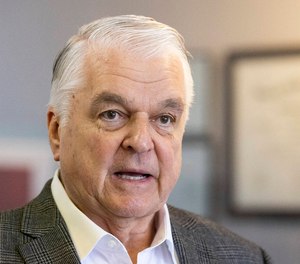 Gov. Steve Sisolak speaks at Refill Pharmacy, on Thursday, Sept. 22, 2022, in Las Vegas. Gov. Sisolak announced the launch of ArrayRx, a digital discount card for prescription drugs where all Nevadans will be able to enroll for the free discount card, regardless of age or income. (Bizuayehu Tesfaye Las Vegas Review-Journal)