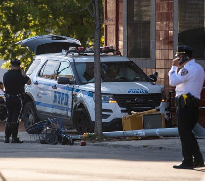 Crash involving NYPD vehicle hurts 10; two people critically injured