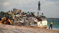 Prisoner's beached yacht demolished