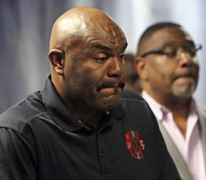A source familiar with the incident said Miami firefighter Lt. Robert Webster will not face charges for an October incident at Jackson Memorial Hospital in which he was seen punching a man, who police said spit on him.
