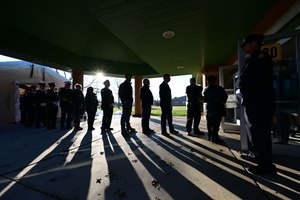 People stand in line to pay their respects on Saturday at the public viewing and funeral for Community Fire Company of New Tripoli firefighters Zachary Paris, 36, and Marvin Gruber, 59.