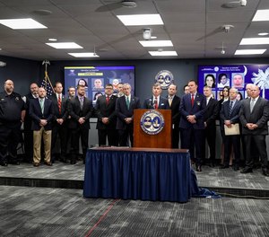 South Carolina Attorney General Alan Wilson, surrounded by law enforcement officials from around the state, announces a major investigation related to Mexican drug cartels.