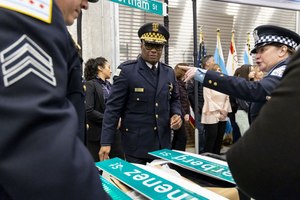 Chicago police Superintendent David Brown looks at signs for fallen officers on Jan. 25 during a ribbon-cutting event for the new Public Safety Training Center.