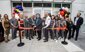 Staff members joined City of Miami Commissioner Joe Carollo (center), CEO Carlos Migoya (left) and Miami Fire Chief Joseph F. Zahralban (right), during the ribbon cutting ceremony for the new Miami Firefighters Health & Wellness Center. Free physicals and screenings for city firefighters will be provided.