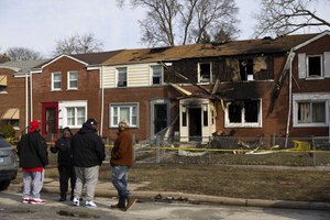 Four firefighters were injured Tuesday morning in a blaze where a mayday alert was called at an apartment building in the Jeffrey Manor neighborhood on Chicago's Far South Side.