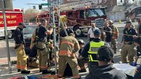 N.Y. firefighters rescue woman who fell into storm drain