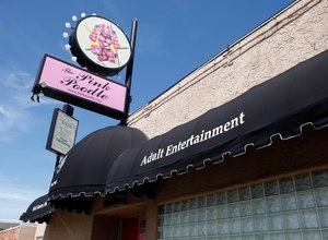 The Pink Poodle is San Jose’s only “all-nude” strip club. A video shows a dancer getting out of a fire truck.
