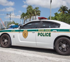 The legislation allows a three-year transition to switch MDPD cars to the sheriff motif, including deputy badges with stars and a color scheme dominated by dark green.