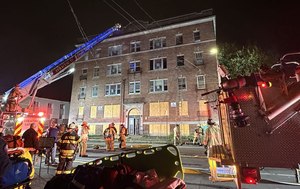 The 2-alarm fire at a vacant Syracuse apartment building drew 63 firefighters.