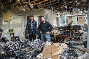 Two staff members at the facility, Hermie Magistrado (left) and Tim Spencer, were instrumental in evacuating residents.