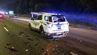 Cruiser struck while working wreck on Ala. interstate, sending 2 officers to hospital