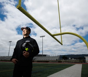 Scott Campbell at the Christopher High School football field on May 26, 2023. Campbell, who was a San Jose firefighter for 26 years and spent his free time refereeing high school and college sports, has been selected to become an NFL referee
