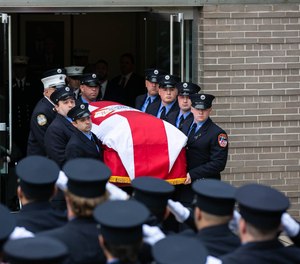 Funeral procession for EMS Lieutenant Alison Russo-Elling.