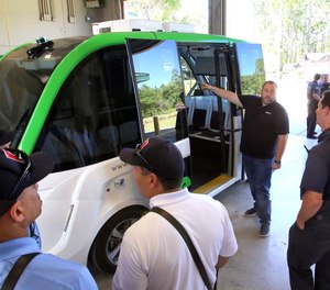 Rescue personnel get a hands-on tour of the Beep AutoNom Shuttle, at Orlando Fire Department Station 16.