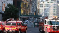 Fluid leak blamed for NYC crane fire, collapse that injured 12