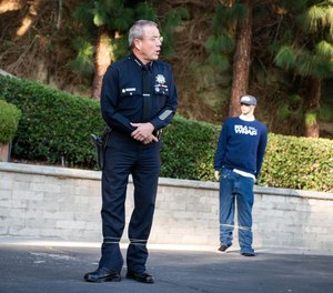 Los Angeles Police Chief Michel Moore is shot with a BolaWrap during a demonstration of the remote restraint device at the LAPD Police Academy in Los Angeles on Monday, December 9, 2019.