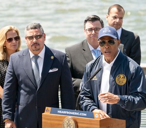 New York City Mayor Eric Adams speaks beside NYPD Commissioner Edward Caban during a press conference on permitting for drone operations in New York City.