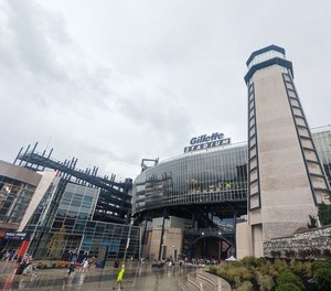 Firefighters Anthony Colella and Mark McCullough sprang into action when they noticed a man had collapsed and wasn't breathing at Sunday's NFL game between the New England Patriots and the Miami Dolphins.