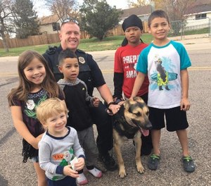 Fort Collins' community policing officers build trust by developing one-on-one relationships with citizens through programs such as “Shop with a Cop” and “ride-alongs.”