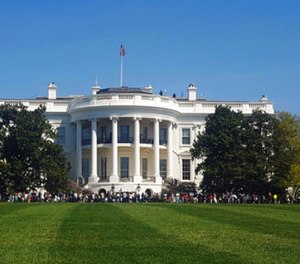 In this April 17, 2016 file photo, people visit the south lawn during the annual White House Spring Garden tours in Washington.