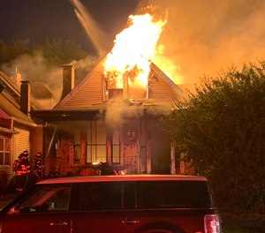 At 9:35 p.m., a mayday was issued after five firefighters fell through the second floor of the home, dropping about 10 feet to the first floor, according to IFD Battalion Chief Rita Reith. They landed near the front door of the structure and were quickly accounted for.