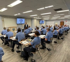 Providence Police recruits attend a city council meeting in Providence, Rhode Island.