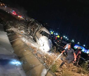 The plane went off the runway while landing due to a technical malfunction.