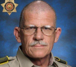 This undated photo released by the San Bernardino County Sheriff's Department shows deputy Lawrence Falce.