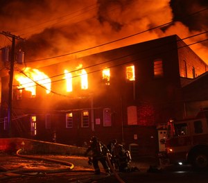 Hundreds of firefighters from departments around the area, including Bergen, Essex, Passaic and Union counties, joined Passaic crews to contain the sky-high flames in frigid temperatures Friday night at Majestic Industries and the Qualco chemical plant on Passaic Street.