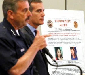 Los Angeles Police Chief Charlie Beck, left, and Mayor Eric Garcetti announce the arrest of a suspect in the 2011 kidnapping and murders of two young women, at police headquarters in downtown Los Angeles Tuesday, May 30, 2017.