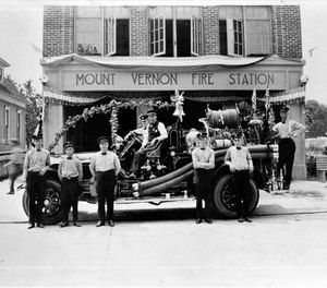This photo shows the Mount Vernon Fire Department station and its first motorized apparatus in 1921. The department will be ending its volunteer program after nearly 130 years due to difficulty recruiting volunteers. (Photo/Mount Vernon Fire Department Facebook)