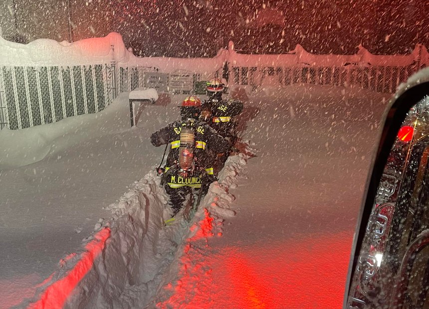 The Carthage Fire Department posted a picture of firefighters trying to make their way to a home through waist-deep snow on Nov. 18.