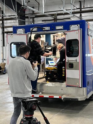 A production crew films STAR Ambulance Service providers using the Panasonic Connect TOUGHBOOK G2.
