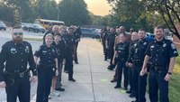 Heartwarming: Ky. police line sidewalk to welcome fallen officer's son on first day of school
