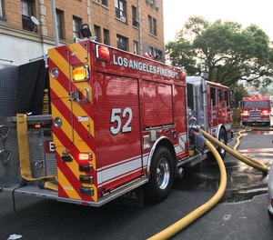 An investigation by the Los Angeles Fire Department’s Arson/Counter-Terrorism Section determined that sparks from responding firefighters ignited a fire that injured two people and displaced a family.