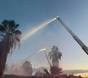 Fresno firefighters arrived to find flames throughout the building.