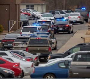 Emergency crews respond to Marshall County High School after a fatal school shooting Tuesday, Jan. 23, 2018, in Benton, Ky.