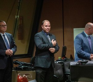 Former Detective David March, from left, Chicago Police Officer Thomas Gaffney and former officer Joseph Walsh appear at a pre-trial hearing with Judge Domenica A. Stephenson at Leighton Criminal Court Building in Chicago on Tuesday, Oct. 30, 2018. Prosecutors have laid out their case against the three Chicago police officers accused of participating in a cover-up of the fatal shooting of Laquan McDonald. (Zbigniew Bzdak/Chicago Tribune via AP, Pool)