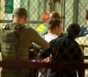 In this frame grab from video provided by WPLG-TV, police take Nikolas Cruz into Broward County jail on Thursday, Feb. 15, 2018 in Fort Lauderdale, Fla.