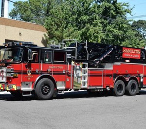 Two ladder trucks and six engines arrived on the scene to see the home of their fellow firefighter was on fire. (Photo/Hamilton Township Professional Firefighters)