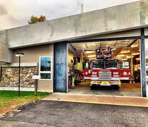 The South Portland Fire Department's new $1.1 million ladder truck caught fire after it hit a power line.