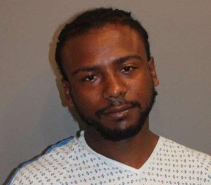 Andre McCrae, 28, is accused of attacking paramedics who responded to a reported overdose on a bus.