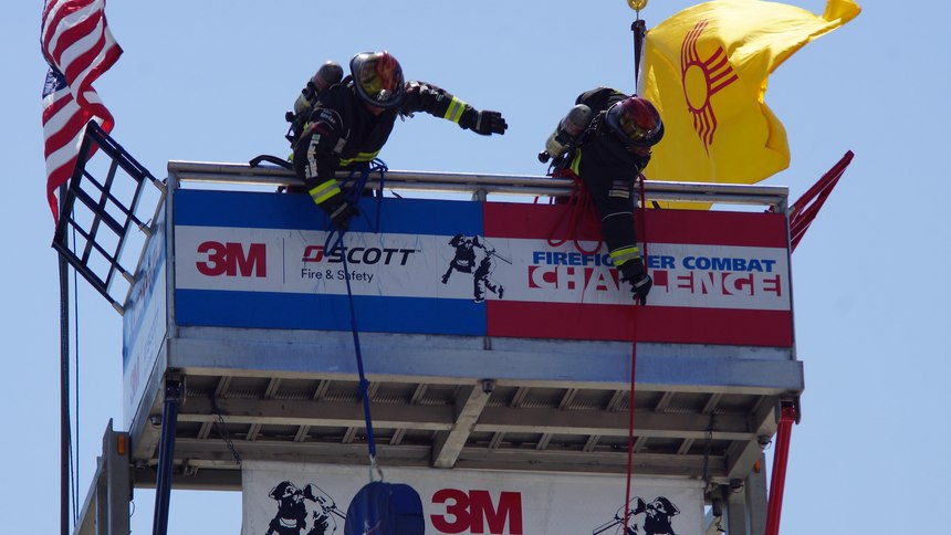 Once at the top of the tower, competitors must hoist a 42-lb. donut roll of large diameter hose.