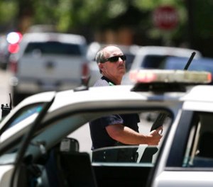 Dallas Police guard an area of a neighborhood where a shooting took place in east Dallas, Monday, May 1, 2017. (AP Photo/LM Otero)