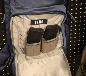 MOLLE-compatible gear, such as mag pouches, can be attached inside the M4 pack.