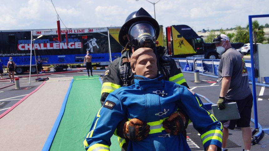 For the final leg of the course, competitors lift and drag a 175-lb. Rescue Randy mannequin backward a distance of 100 feet.